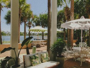 Outdoor dining - Lakefront Downtown Carillon Beach with 4 POOLS! (Panama City Beach)