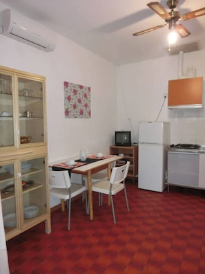 Apartment, 2 Bedrooms, Patio, Garden View | Dining - Cozy Villa Steps From the Beach (San Michele al Tagliamento)