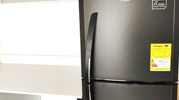 Fridge, microwave, cookware/dishes/utensils