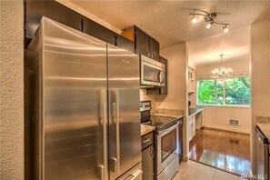 Fridge, microwave, oven, stovetop - Downtown Kirkland Condo! Newly Renovated with Patio (Kirkland)