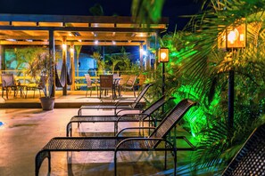 Outdoor pool, open 8:00 AM to 8:00 PM, pool umbrellas, sun loungers