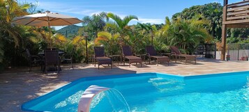 Outdoor pool, open 8:00 AM to 8:00 PM, pool umbrellas, sun loungers