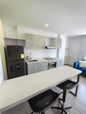 Apartamento família | Área de estar