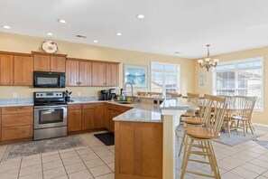 Fridge, microwave, oven, stovetop - Endorfinn by Brunswick Vacation Rentals: w/ Heated Pool, Near Beach, Water Views (Ocean Isle Beach)