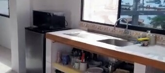 Walking distance to Playa de Oro and Mann Family size condo, wifi, ac,