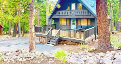 Modern A-Frame cabin that is a nice stroll down to the lake.