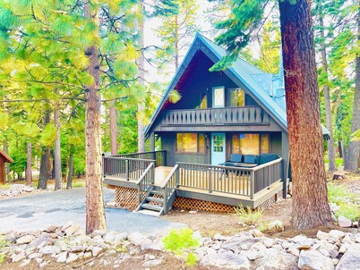 Modern A-Frame cabin that is a nice stroll down to the lake. 