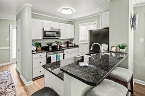 Fridge, microwave, oven, stovetop - Condo across the street from the beach with pool, spa, & private balcony (North Myrtle Beach)