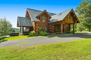 Image of Log manor on 65 private acres of land with entertaining amenities & hot tub