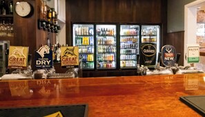 A bar with multiple taps including Great Northern Brewing Co., Carlton Dry, Great Northern Brewing Co. Super Crisp, Guinness, and Tooheys New. - Royal Hotel Guyra (Guyra)