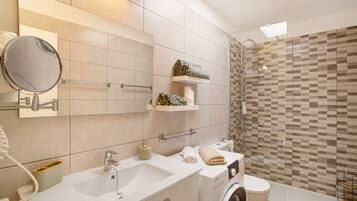 Shower, hair dryer, towels