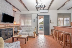 TV, fireplace - Holiday Home 'Casa Rural Montemayor' with Pool and Private Terrace (Moguer)
