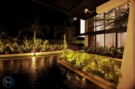 Property grounds. Villa in Kollam with Private Pool
