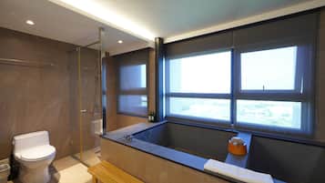 Design Double Room, 1 Bedroom, Partial Ocean View, Oceanfront | Bathroom | Separate tub and shower, spring water tub, hydromassage showerhead