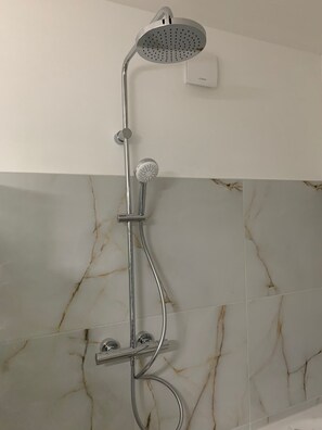 Hair dryer, slippers, towels, soap