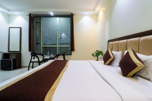 Premium bedding, down duvets, free minibar items, free WiFi