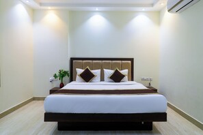 Premium bedding, down duvets, free minibar items, free WiFi