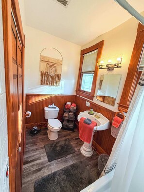 Bathtub, hair dryer, towels