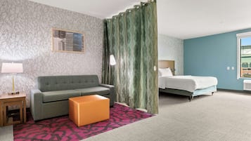 Premium bedding, desk, laptop workspace, blackout curtains