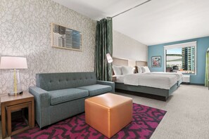 Premium bedding, desk, laptop workspace, blackout drapes