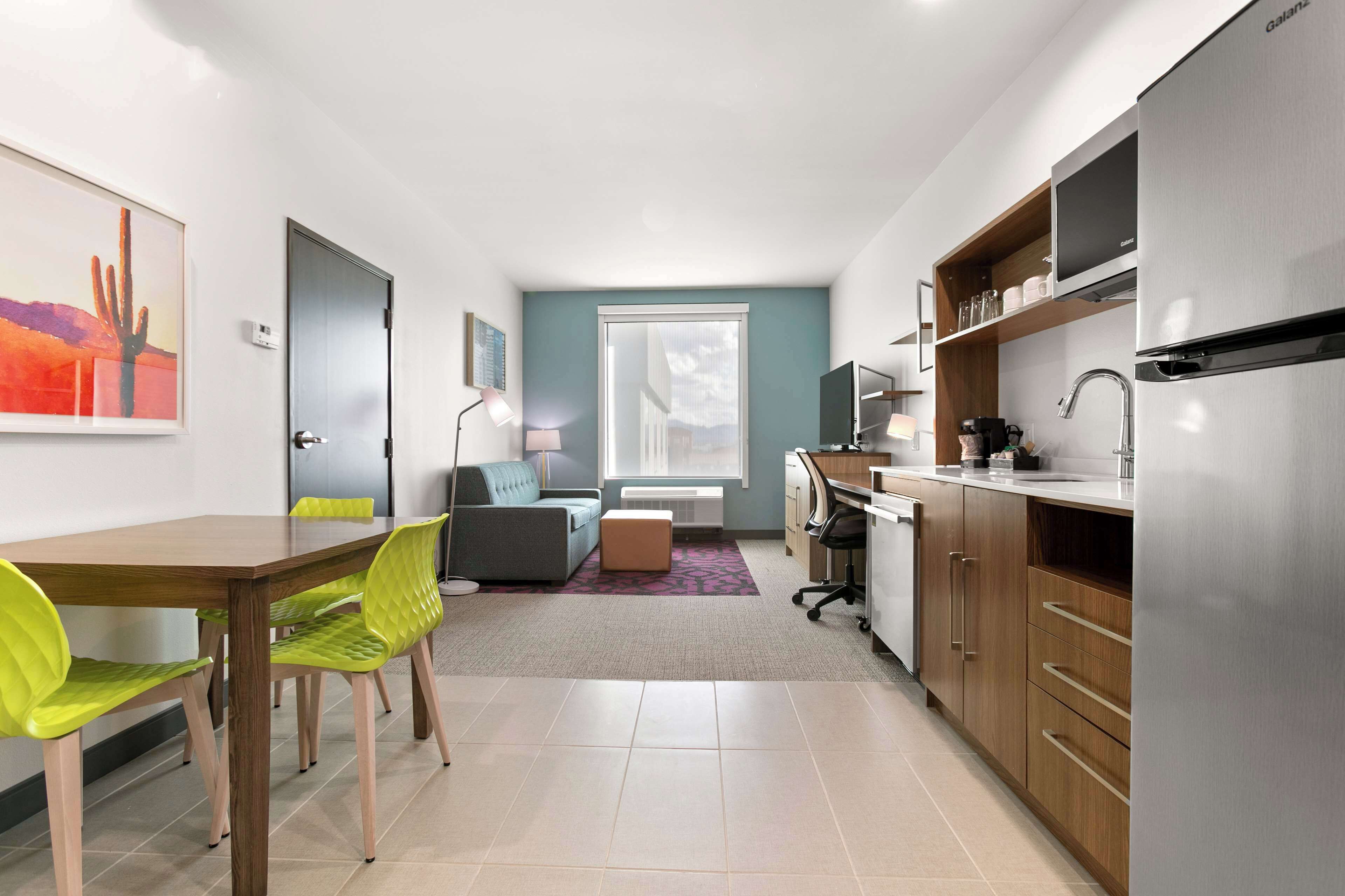 Suite, 1 Bedroom | Private kitchen | Coffee/tea maker, dining tables