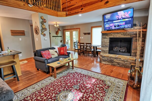 Smart TV, fireplace, books