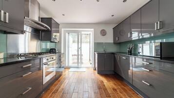 Apartment | Private kitchen | Fridge, microwave, oven, stovetop