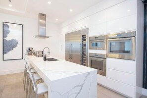 Fridge, microwave, oven, stovetop - Rum Point Resort #403 by Grand Cayman Villas (Grand Cayman)