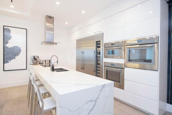 Fridge, microwave, oven, stovetop - Rum Point Resort #403 by Grand Cayman Villas (Grand Cayman)
