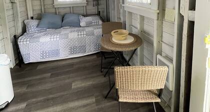 The Goldfinch rustic lakefront cottage at The Pier at Canadohta Lake sleeps 2!