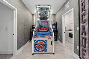 Games room - The Divine | Breathtaking home on I-Drive - designer master BR, theme RMs, pool (Orlando)