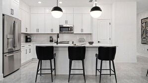 Coffee/tea maker, fridge, microwave, oven - Rory’s Residence | Instaworthy home near parks w social media BR, pool, luxe BRs (Orlando)