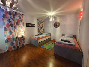 3 bedrooms, desk, iron/ironing board, travel cot