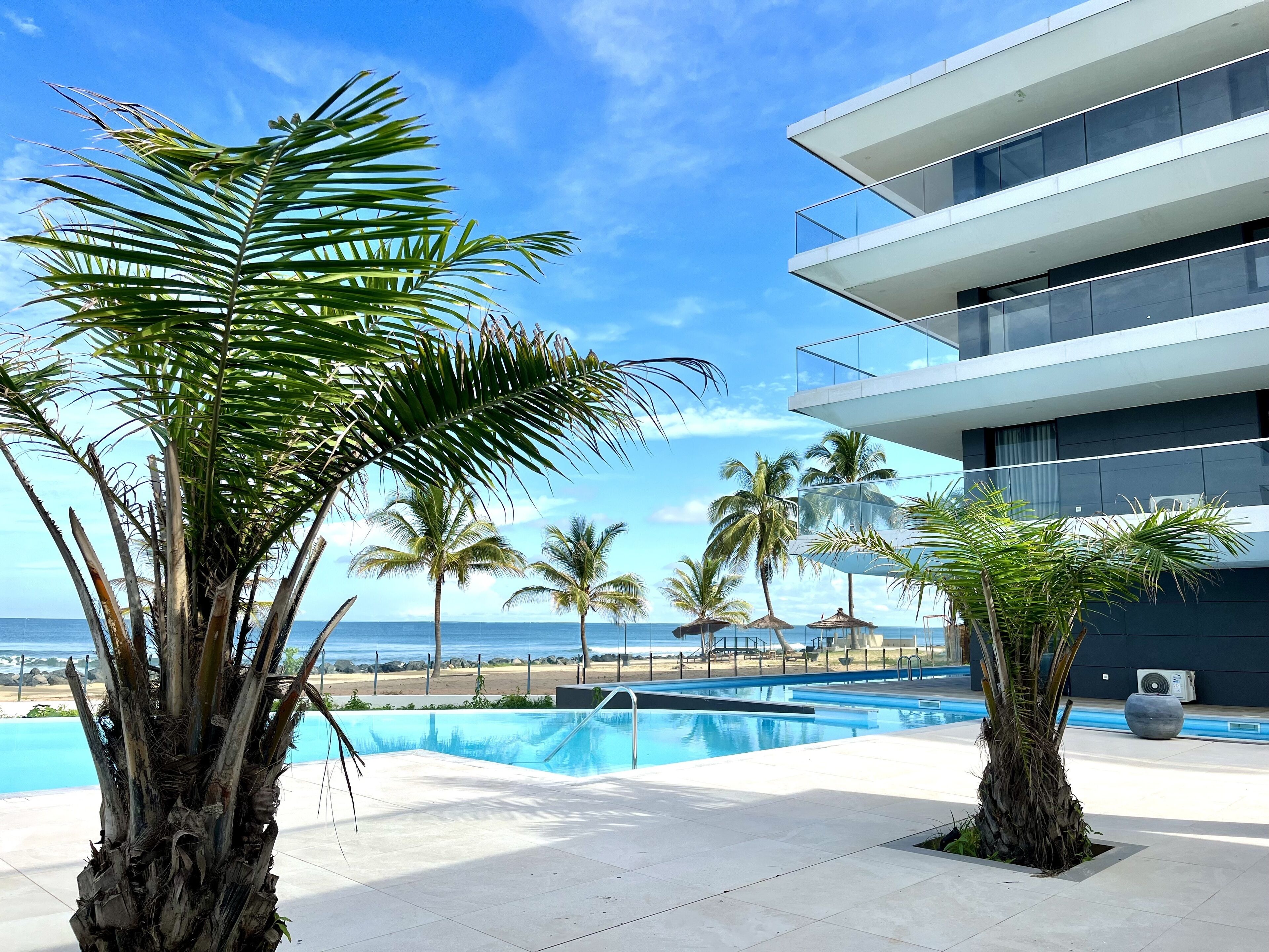 On the beach, sun-loungers, beach umbrellas