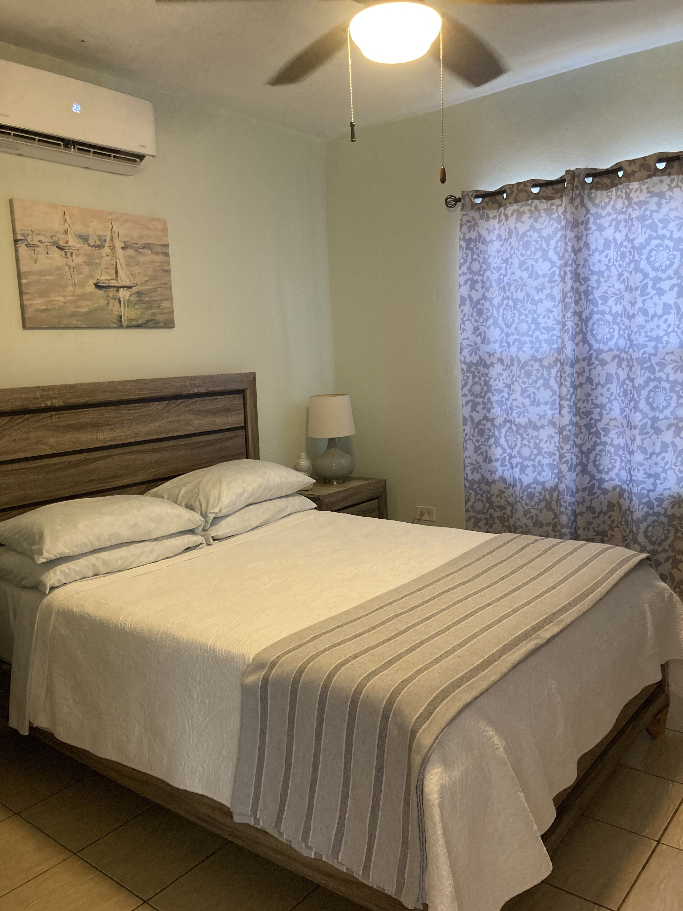 Basic Room, 1 Queen Bed | Pillowtop beds, individually decorated, individually furnished