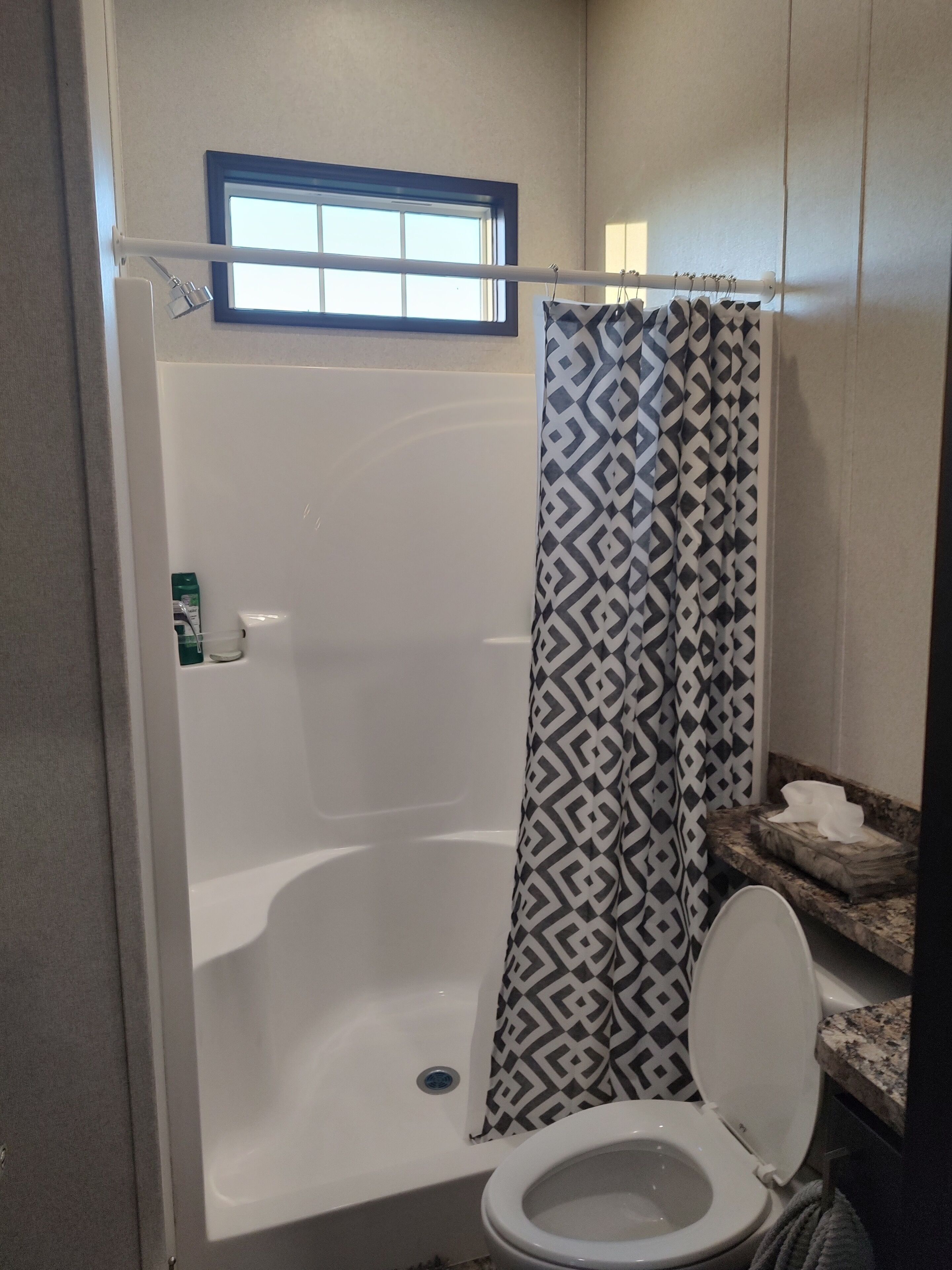 Shower, towels, soap, shampoo