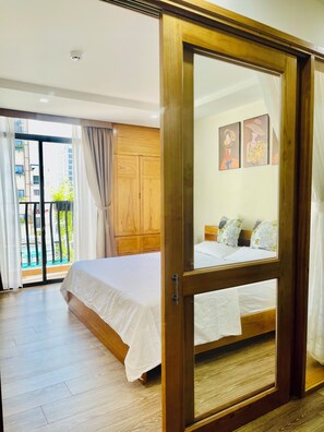 Deluxe Apartment, 1 King Bed, Balcony, City View | 1 bedroom, premium bedding, pillow-top beds, minibar - Hana Hotel & Apartment Da Nang (Da Nang)