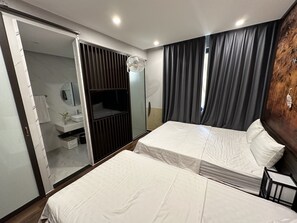 3 habitaciones, tabla de planchar con plancha, wifi y ropa de cama