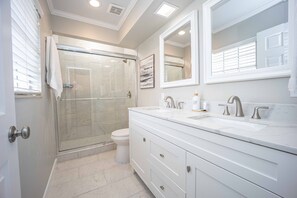 Shower, hair dryer, towels, soap