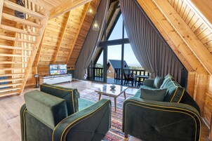 Grand Bungalow | Living area | 110-cm Smart TV with digital channels, Netflix, streaming services