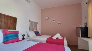 Basic Triple Room | Premium bedding, down comforters