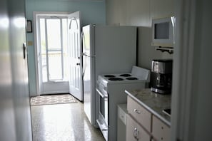 Economy Cottage | Private kitchenette | Microwave, coffee/tea maker, electric kettle, toaster