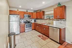 Fridge, microwave, dishwasher, coffee/tea maker