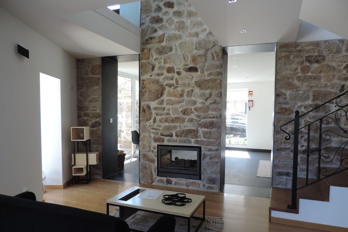 Exclusive Condo | Living area | Fireplace