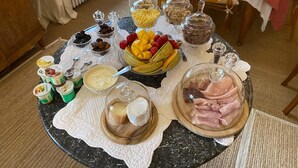 A breakfast buffet with various food items and condiments. - Domaine de la creuse (Moussey)