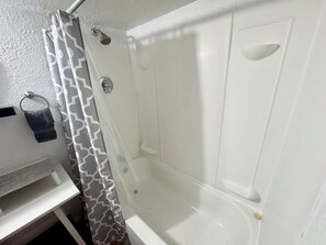 Hair dryer, towels, soap, shampoo