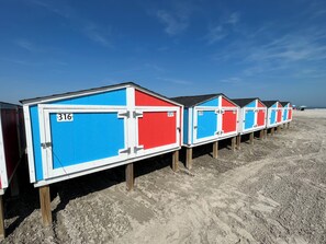 On the beach, sun loungers