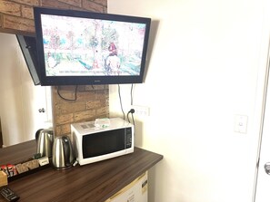 Mini-fridge, microwave, toaster, cookware/dishes/utensils