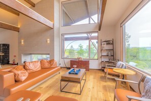 Deluxe Chalet | Living area | Flat-screen TV