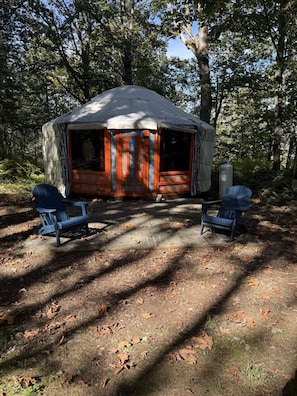 A yurt with two blue chairs outside, surrounded by trees. - Gaia Yurt | Cedar Hot Tub | 1 hr to Skiing & Mt Rainier (Buckley)
